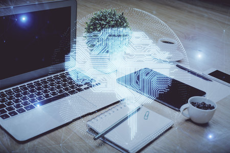 Double exposure of desktop with computer and brain drawing hologram. Artificial intelligence...