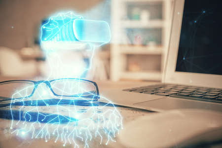 AR drawing with glasses on the table background. Concept of augmented reality. Double exposure.の写真素材