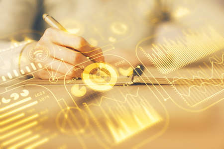 Technology theme hologram over woman's hands taking notes background. Concept of Tech. Double...
