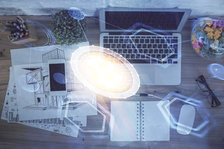 Blockchain theme hologram drawings over computer on the desktop background. Top view. Double exposure.の写真素材