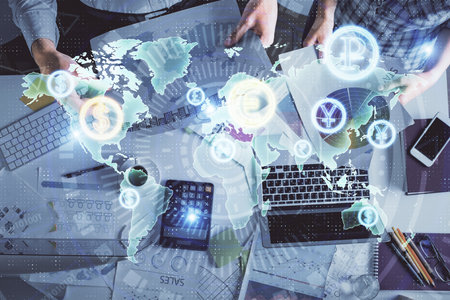Double exposure of man and woman working together and financial chart hologram drawing. market...