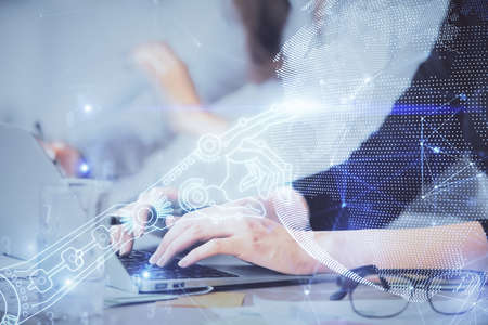 Double exposure of woman hands typing on computer and technology theme drawing. High Tech concept.
