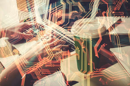 Double exposure of woman hands typing on computer and technology theme drawing. High Tech concept.