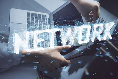 Multi exposure of woman hands working on computer and data theme hologram drawing. Tech concept.