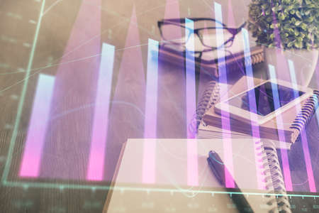 Double exposure of forex chart drawing and cell phone background. Concept of financial trading