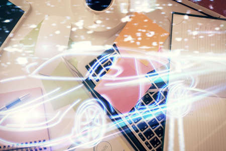 Auto pilot hologram drawing over computer on the desktop background. Top view. Double exposure. Tech concept.の写真素材