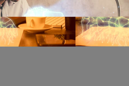 Double exposure of man's hands holding and using a digital device and AR glasses drawing. Virtual...