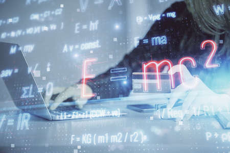 Multi exposure of woman on-line shopping holding a credit card and formula drawing. E-learning...