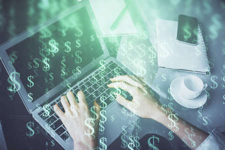 Double exposure of woman hands typing on computer and forex chart hologram drawing. Stock market...