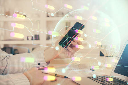 Multi exposure of man's hands holding and using a digital device and map drawing. International business concept.の写真素材