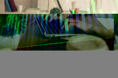 Double exposure of woman hands typing on computer and forex chart hologram drawing. Stock market...