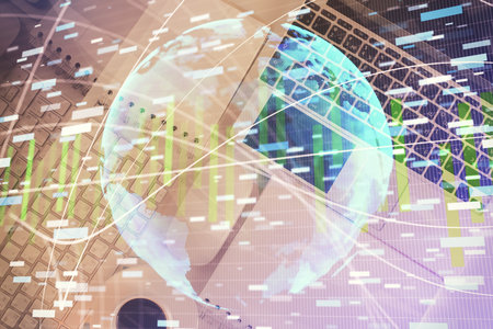 Business theme hologram drawings over computer on the desktop background. Top view. Multi exposure. Concept of international connections.の写真素材