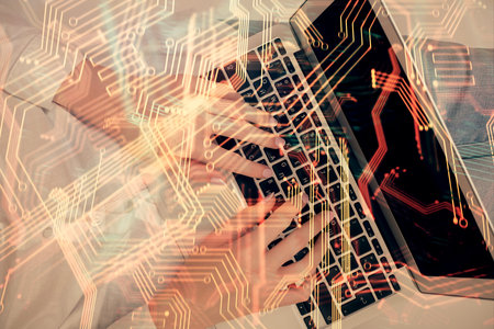 Double exposure of woman hands working on computer and tech theme hologram drawing. Top View. Technology concept.の写真素材