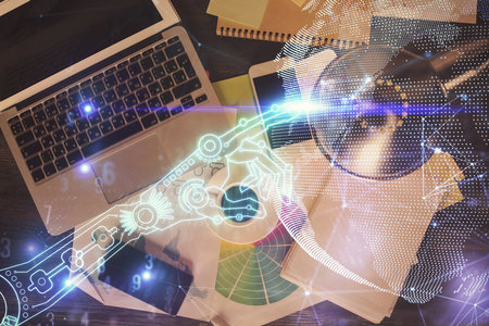 Technology hologram drawing over computer on the desktop background. Top view. Double exposure. Tech concept.の写真素材