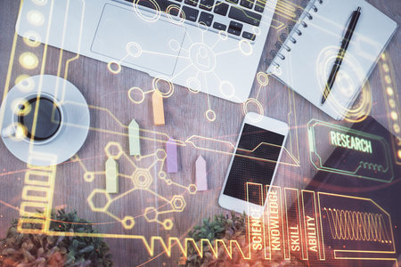 Double exposure of technology theme drawing over work table desktop. Top view. Global data analysis concept.の写真素材