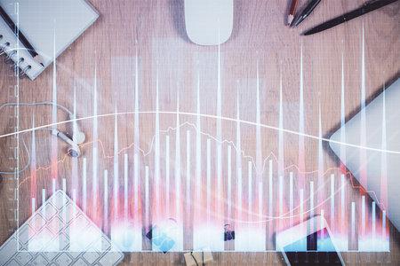 Multi exposure of forex graph hologram over desktop with phone. Top view. Mobile trade platform concept.の写真素材