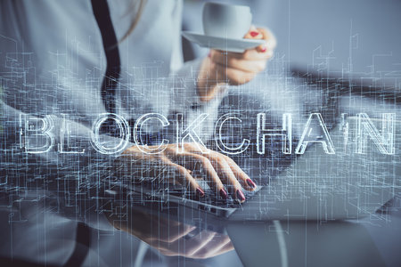Double exposure of woman hands typing on computer and crypto market theme hologram drawing....