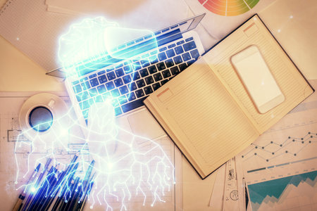 AR hologram drawings over computer on the desktop background. Top view. Multi exposure. Concept of augmented reality.の写真素材