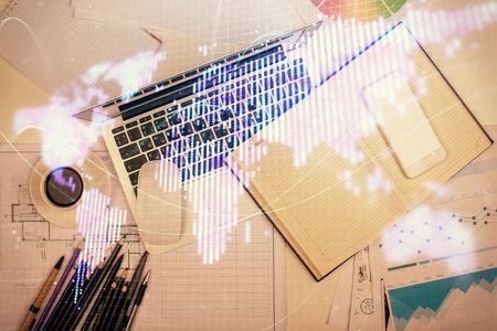 Business theme hologram drawings over computer on the desktop background. Top view. Multi exposure. Concept of international connections.の写真素材
