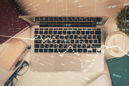 Multi exposure of financial chart drawing over table background with computer. Concept of research. Top view.の写真素材