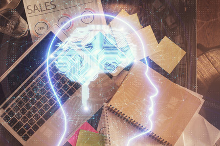 Double exposure of brain drawing hologram over topview work table background with computer. Concept...