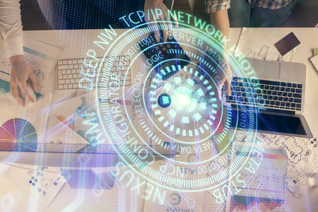 Double exposure of man and woman working together and technology theme drawing hologram. Big data concept. Computer background.の写真素材