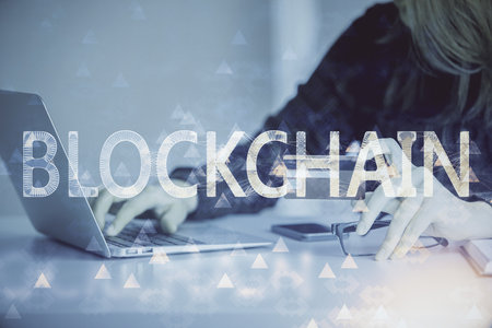 Multi exposure of woman on-line shopping holding a credit card and crypto theme drawing. Blockchain E-commerce concept.の写真素材