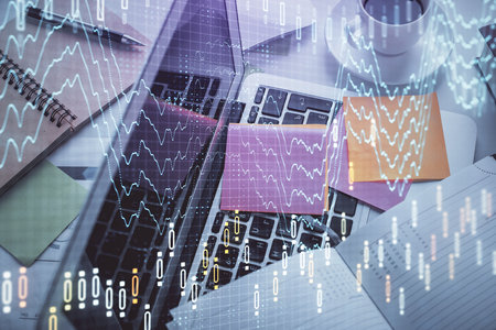 Multi exposure of financial chart drawing over table background with computer. Concept of research...