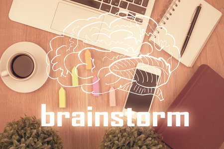 Multi exposure of creative drawing over table with phone. Top view. Concept of startup.の写真素材