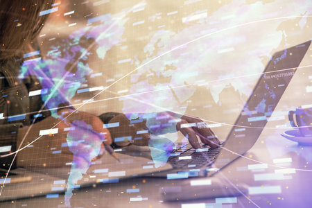 Multi exposure of woman hands working on computer and data theme hologram drawing. Tech concept.の写真素材