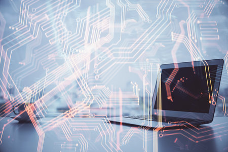 Computer on desktop in office with technology theme hologram. Multi exposure. Tech concept.の写真素材