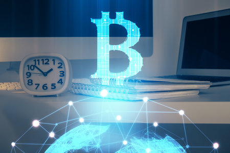 Multi exposure of blockchain theme hologram and table with computer background. Concept of bitcoin...