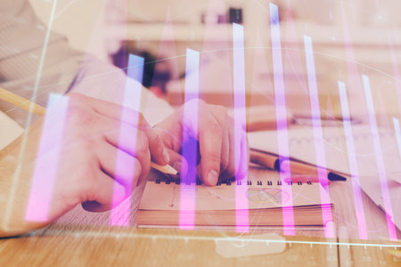 Multi exposure closeup hands with stock market forex graph. Concept of research and analysis.の写真素材