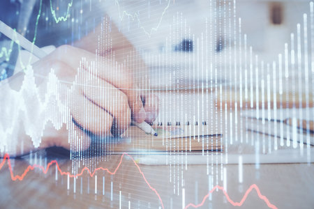 Multi exposure closeup hands with stock market forex graph. Concept of research and analysis.の写真素材