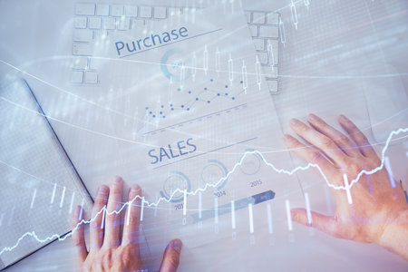 FOREX chart multi exposure with work table background. Top View. Concept of success.の写真素材