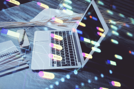 Multi exposure of table with computer on background and data theme drawing. Concept of innovation.の写真素材
