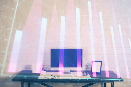Forex Chart hologram on table with computer background. Double exposure. Concept of financial markets.の写真素材