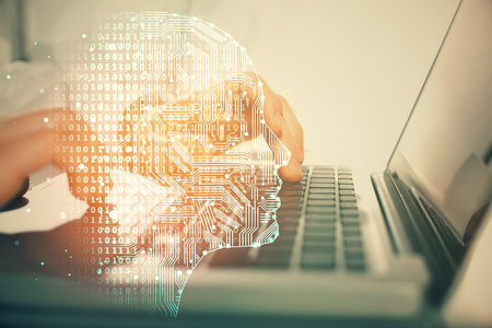Man typing on keyboard background with brain hologram. Concept of big Data.の写真素材