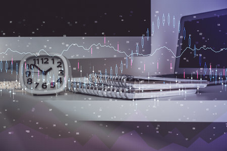 Forex market graph hologram and personal computer on background. Multi exposure. Concept of...