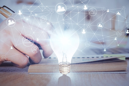 Innovative your business. Idea concept icon on writing man's hand background. Multi exposure.の写真素材