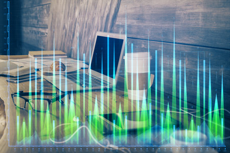 Double exposure of forex chart and work space with computer. Concept of international online trading.の写真素材