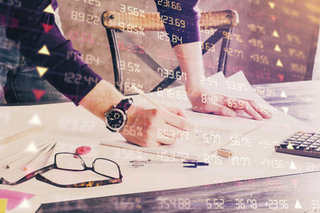 Multi exposure of man standing and planing investment with stock market forex chart background....