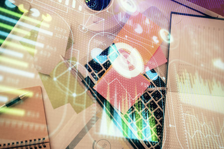 Double exposure of data hologram sketch over study table background with computer. Concept of Ai. Top view.の写真素材