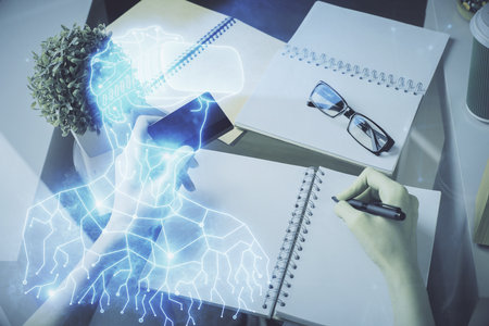 Multi exposure of woman on-line shopping holding a credit card and man in AR glasses drawing. E-learning concept.の写真素材