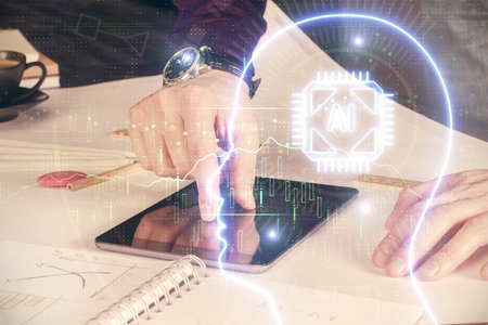 Double exposure of man's hand holding and using a digital device and brain hologram drawing. Data...