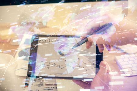 Multi exposure of man's hands holding and using a digital device and data theme drawing. Innovation concept.の写真素材