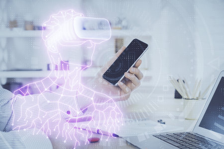 Double exposure of man's hands holding and using a digital device and AR glasses drawing. Virtual reality concept.の写真素材
