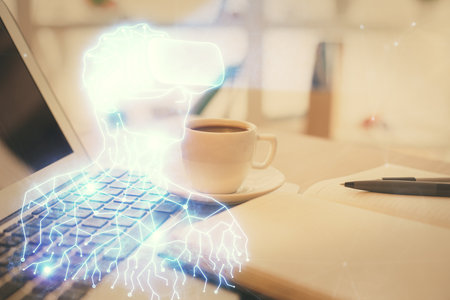 Double exposure of vr glasses drawing and desktop with coffee and items on table background. Concept...