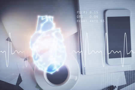 Double exposure of heart drawing over table with phone. Top view. Medical education concept.の写真素材