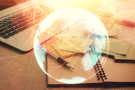 Double exposure of business theme drawing and desktop with coffee and items on table background. Concept of market tradingの写真素材